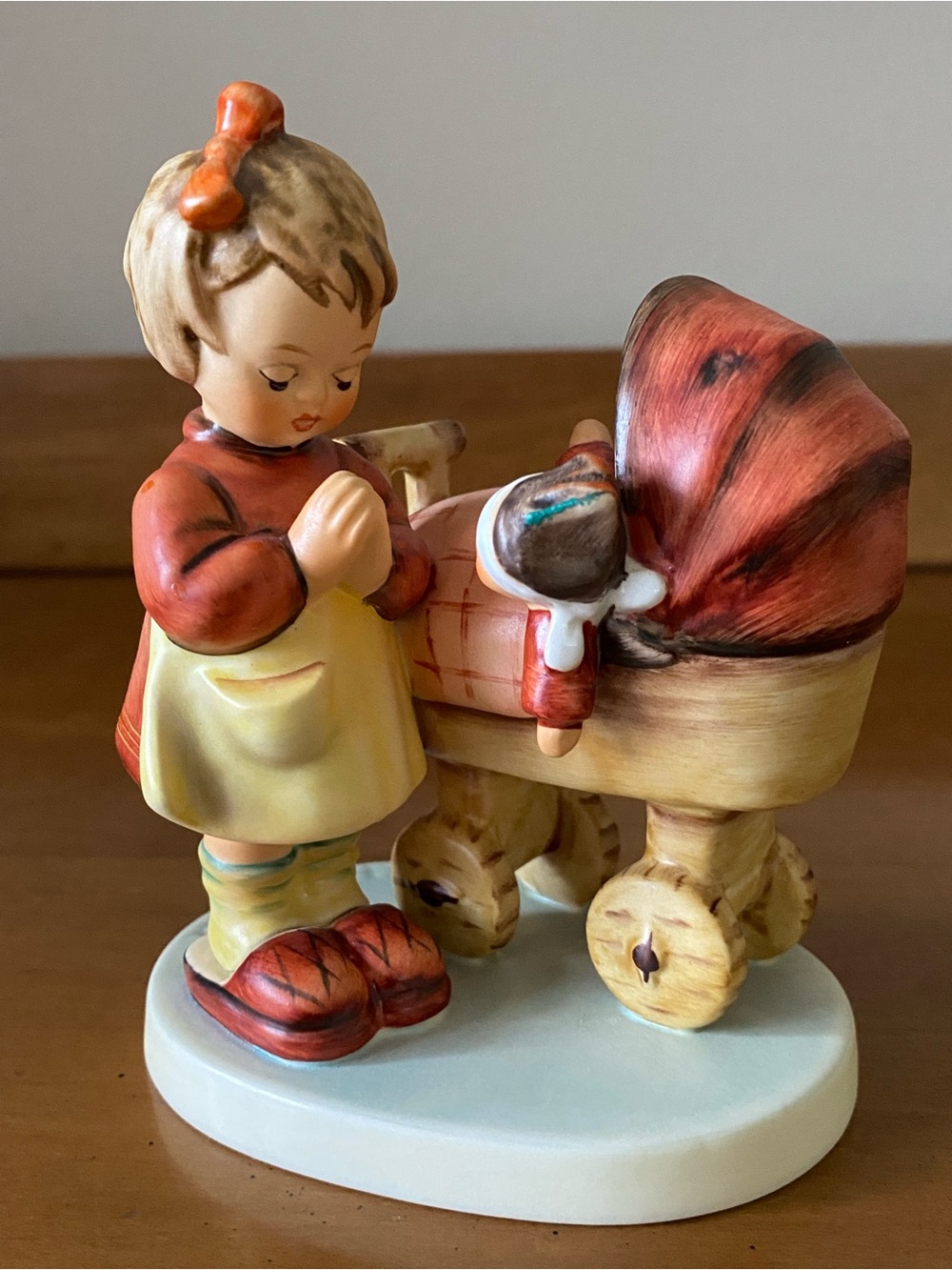 Vintage Hummel “Doll Mother" Figurine little girl praying by a baby in bassinet